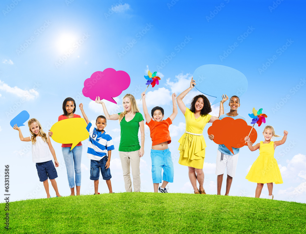 Wall mural group of people holding colorful speech bubbles - Wall murals