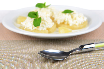 Tasty pineapple with cottage cheese, close up