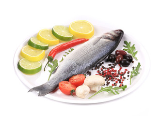 Seabass on plate with citrus and pepper