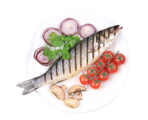 Grilled fish with vegetables.