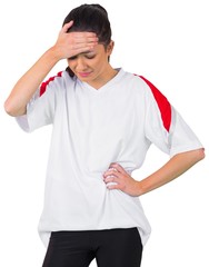 Disappointed football fan in white