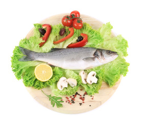 Fresh seabass on platter with lettuce