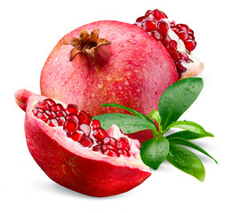Ripe wet pomegranate with piece and leaves isolated on a white