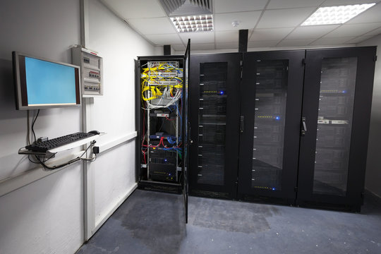 Modern server room interior with black computer cabinets