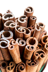 Heap of aromatic cinnamon sticks. Closeup.