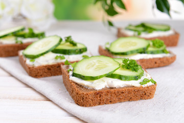 Delicious canapes on table close-up