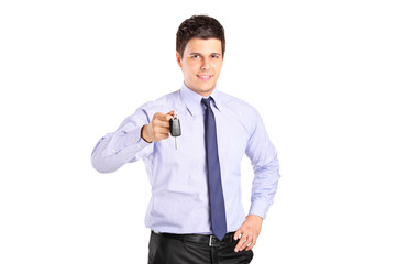 Young man holding a car key