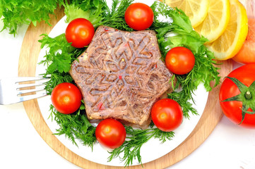 jellied meat with fresh herbs and cherry tomatoes