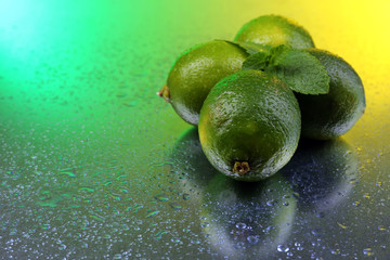 Fresh limes on bright background