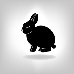 the black stylized silhouette of a rabbit
