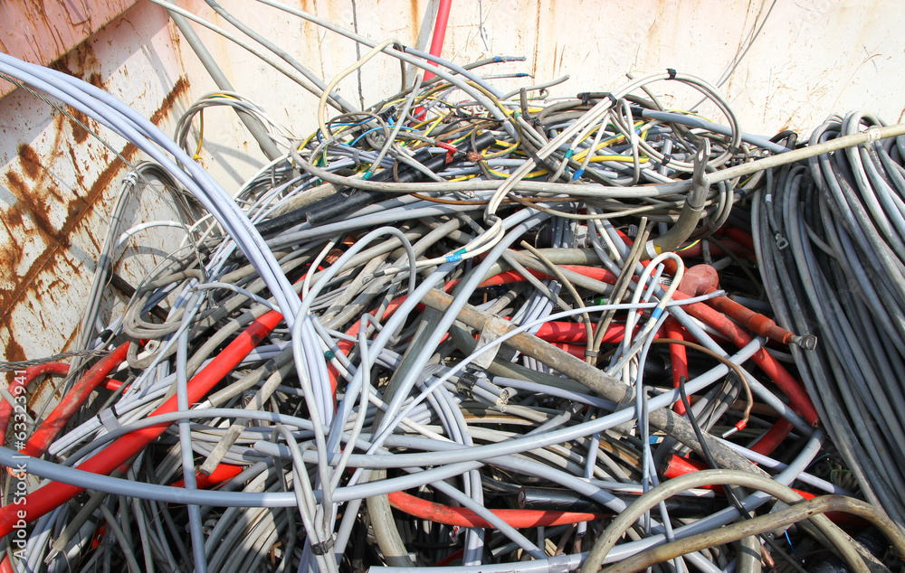 Wall mural Hank of cord amassed in a container in waste landfill