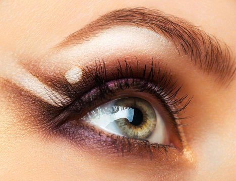 Beautiful womanish eye with glamorous makeup