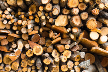 Background of many small pieces of wood pile row