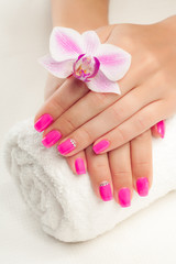 pink manicure on white