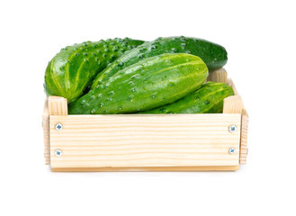 Cucumbers in a wooden box