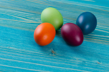 Easter eggs on wooden background