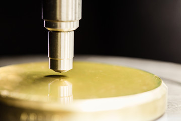 Indenter of rockwell scale c testing with calibration block