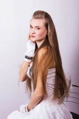 Fototapeta premium Portrait of a beautiful young woman with long hair