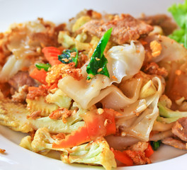 Stir fried noodles with egg, pork, vetgetables, and sauce