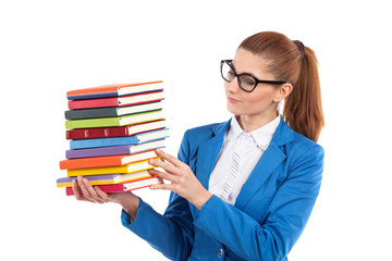 Smart woman holding stack of books