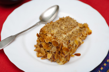 Cake on plate and spoon