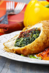 Chicken roll stuffed with spinach and dried tomatoes