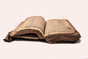 Old Quran Book OnThe White Background