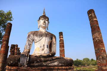 Obraz premium Ancient buddha statue. Sukhothai Historical Park,Thailand