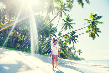A couple relaxing on the beach