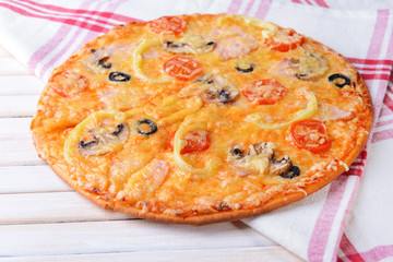 Tasty pizza on table close-up