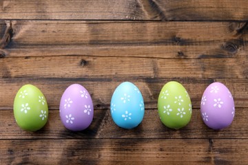 Easter eggs on wooden background