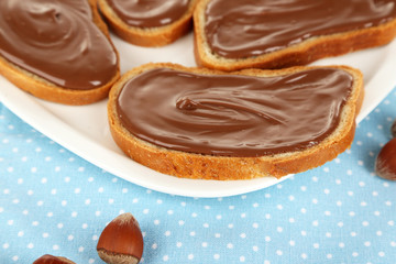 Bread with sweet chocolate hazelnut spread