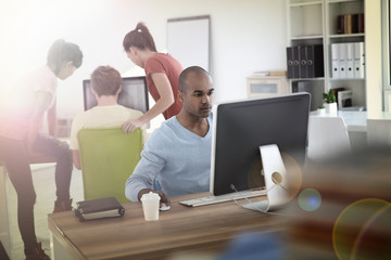 Man working on desktop computer