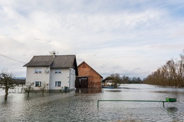House surrounded with water