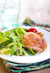 Fried pork chop and salad