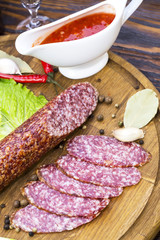 sausage on a wooden plate in a restaurant