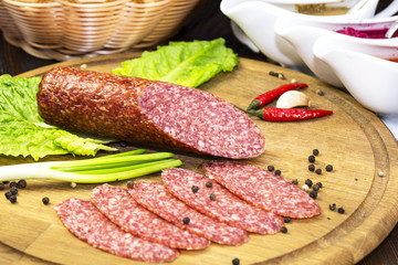 sausage on a wooden plate in a restaurant