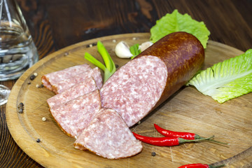 sausage on a wooden plate in a restaurant