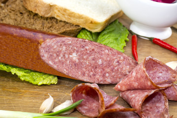sausage on a wooden plate in a restaurant