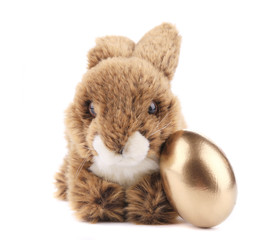 Toy rabbit with egg.