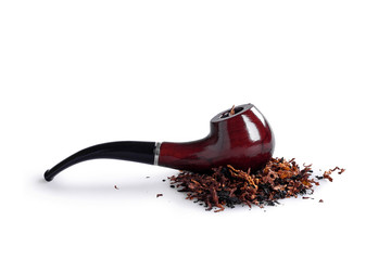 cut and dried tobacco leaves with a pipe