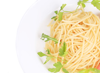 close up of spaghetti with basil