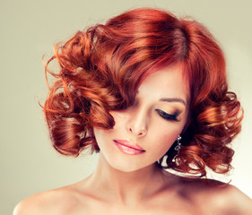 Beautiful model red with curly hair
