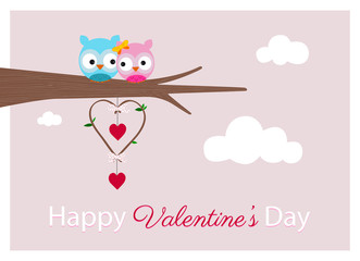 lovely cute owls couple on branch with red hearts