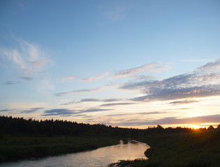 Fototapeta na wymiar sunset on the river in the Ural