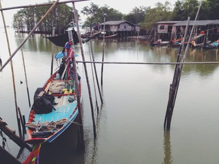 fisherman boat on dock. fisherman village.