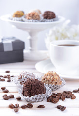 Set of chocolate candies on table on light background