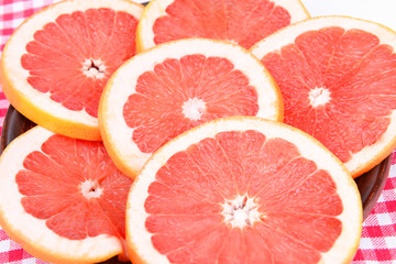 Ripe grapefruit on table close-up