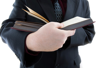 man holding an open book