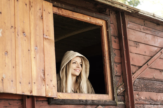 Girl Looking Out The Window